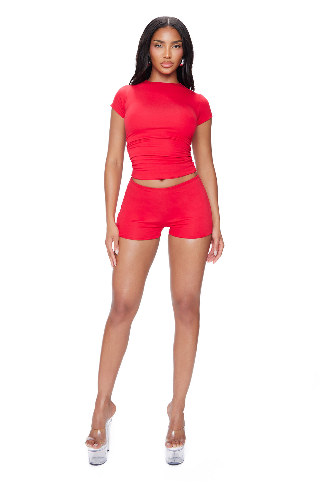Woman wearing a red outfit on a white background. soft modal fabric.
