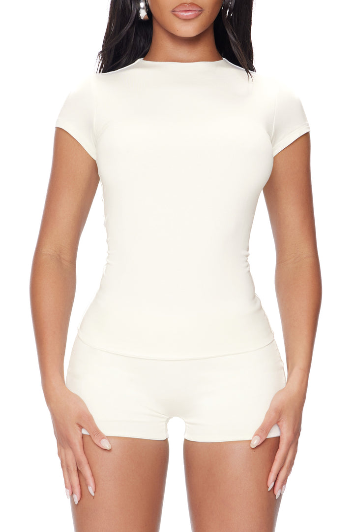 off white top worn by a model on a white background